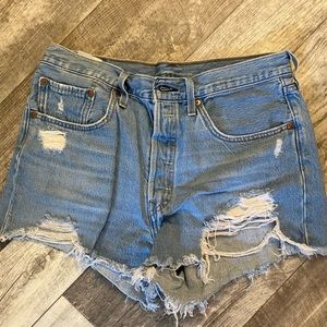 Women’s Levi distressed cut off jeans.